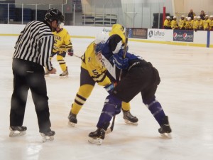 A faceoff during the first period between Saratoga and the Pelham Pelicans.