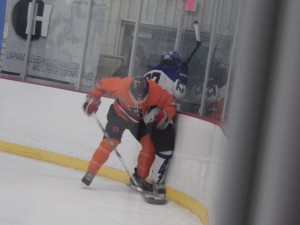 Bethlehem's Nicholas Breiner checks Saratoga's JT Rafferty during the final period of Friday's game. Breiner would receive a game misconduct near the end of the game.