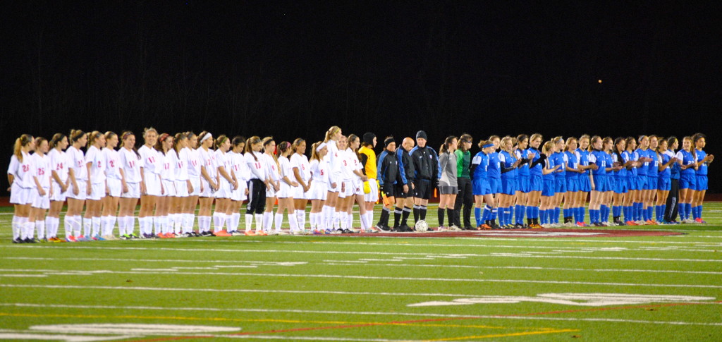 The teams line up after the game. Niskayuna won the Section II Class AA girl's varsity soccer championship against Saratoga Springs on Wednesday.
