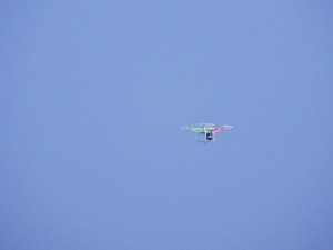 A drone flies overhead at the beginning of the game Friday.
