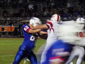 Saratoga tackle Mike Gyamarthy squares off with Guilderland's Andy Hines during Friday's game.