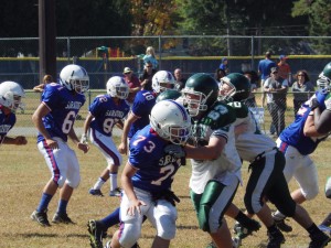 Shen lineman Spencer Dankulich (#63) goes up against Saratoga tackle Paul LaBarge during the fourth quarter of Saturday's game.